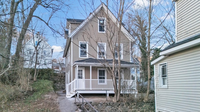 back of house with a porch