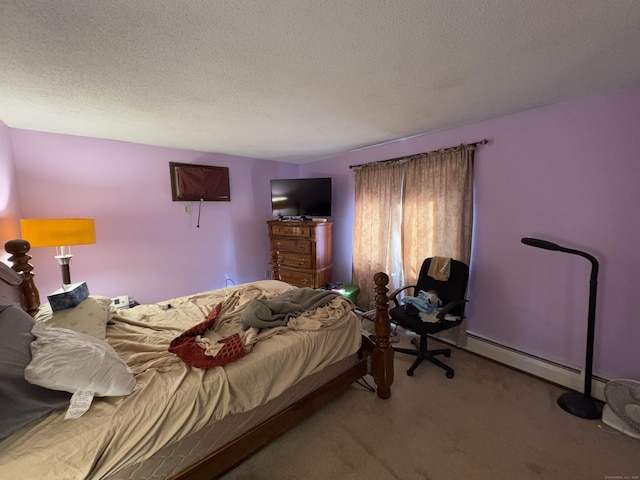 carpeted bedroom featuring a textured ceiling