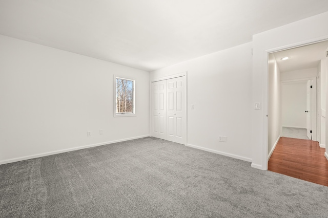 spare room featuring carpet