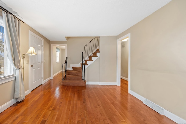 entrance foyer with light wood-type flooring