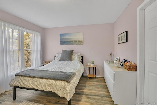 bedroom featuring dark hardwood / wood-style floors