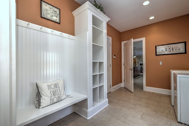 mudroom featuring separate washer and dryer