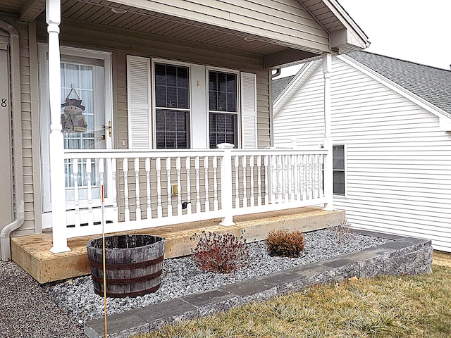 doorway to property featuring a porch