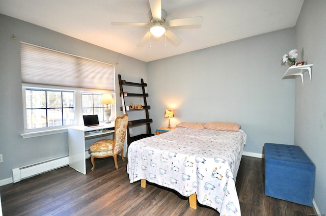 bedroom with ceiling fan, baseboards, baseboard heating, and dark wood finished floors