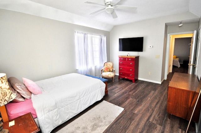 bedroom featuring lofted ceiling, dark hardwood / wood-style floors, and ceiling fan