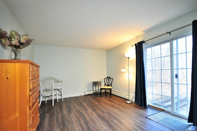 sitting room with dark wood-style flooring, a baseboard radiator, and baseboards