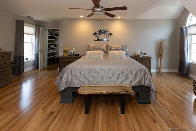 bedroom featuring light wood-style flooring, baseboards, ceiling fan, and recessed lighting