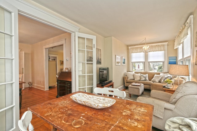 interior space featuring an inviting chandelier and hardwood / wood-style floors