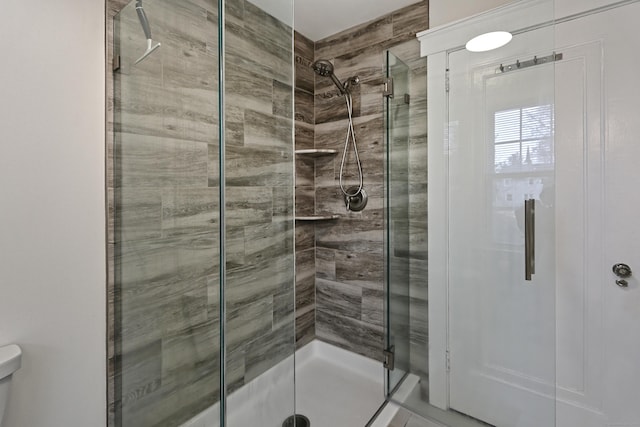 bathroom featuring walk in shower