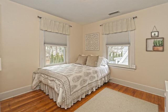 bedroom featuring hardwood / wood-style flooring