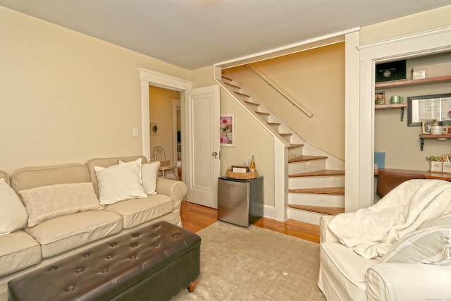 living room with light hardwood / wood-style flooring