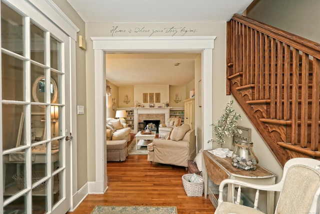 living area featuring hardwood / wood-style floors