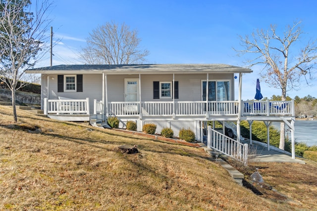 view of front of house featuring a porch and a front lawn