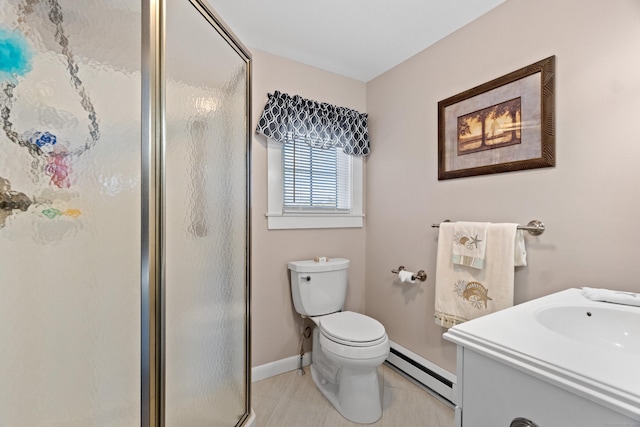 full bathroom with a stall shower, baseboards, toilet, vanity, and a baseboard heating unit