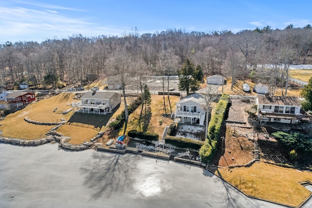 drone / aerial view with a view of trees