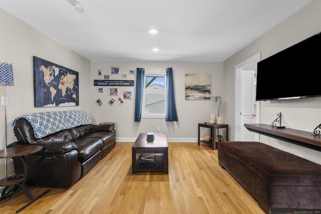 living room with light hardwood / wood-style floors