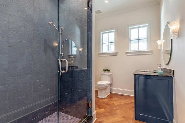 bathroom featuring crown molding, a shower stall, toilet, and visible vents