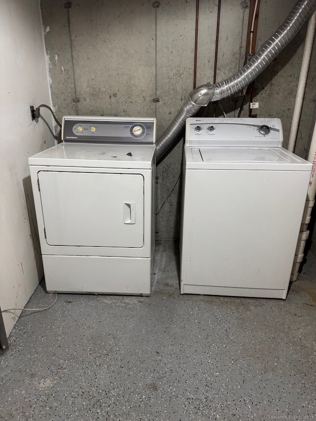 laundry room featuring separate washer and dryer