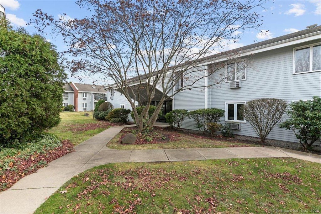 view of front of property with a front lawn