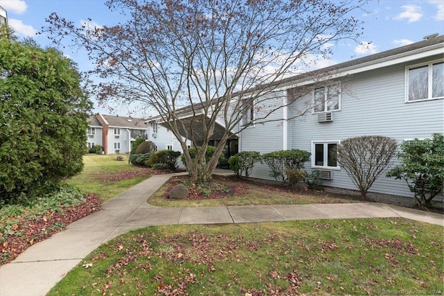 view of front of property with a front lawn