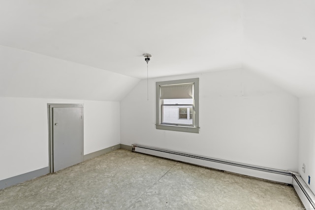 bonus room featuring lofted ceiling and a baseboard radiator