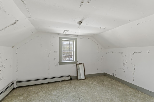 bonus room with baseboard heating and lofted ceiling