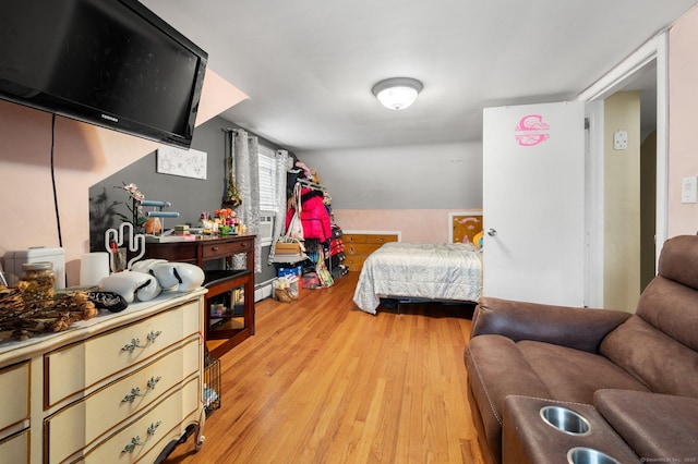 bedroom featuring light wood-type flooring