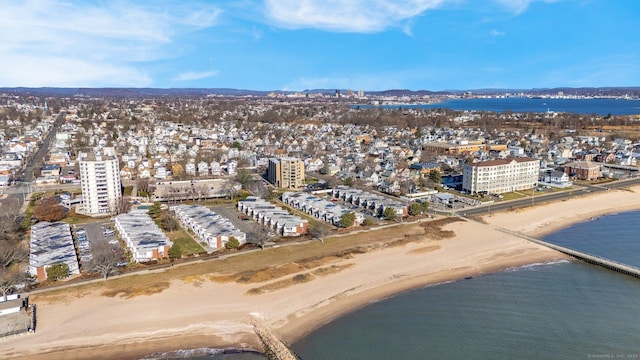 bird's eye view featuring a beach view and a water view