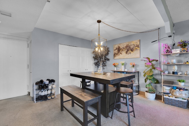 view of carpeted dining space