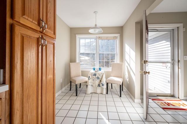 unfurnished room with light tile patterned floors