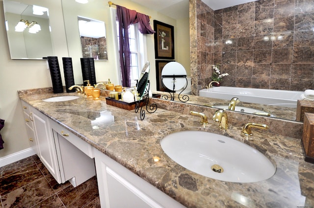 bathroom featuring vanity and a bathtub