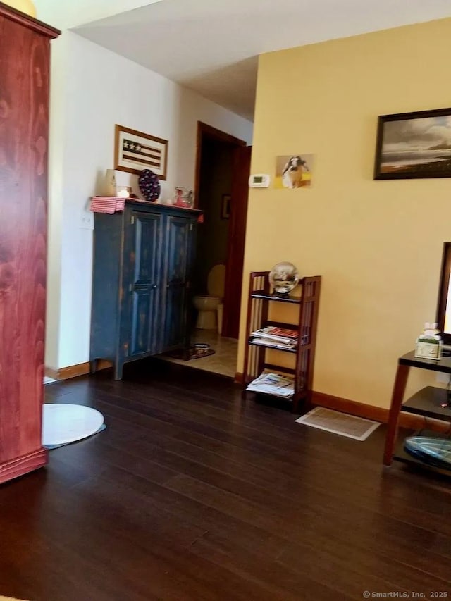 interior space with dark wood-type flooring