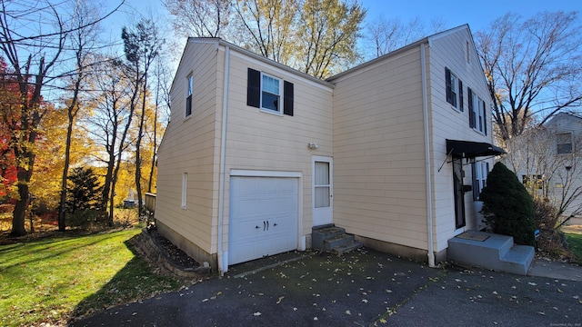 exterior space with a garage