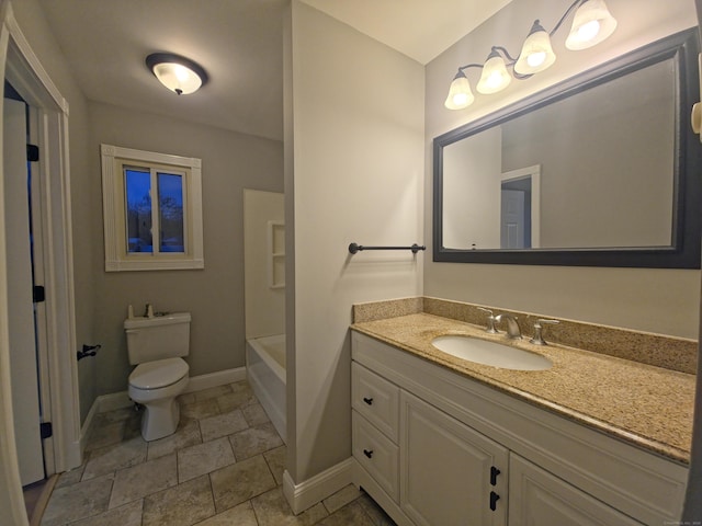 bathroom featuring a shower, toilet, vanity, baseboards, and a bath