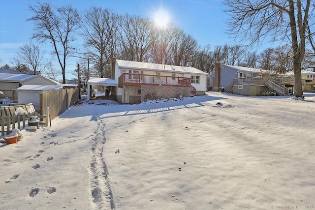 view of front of home featuring a wooden deck