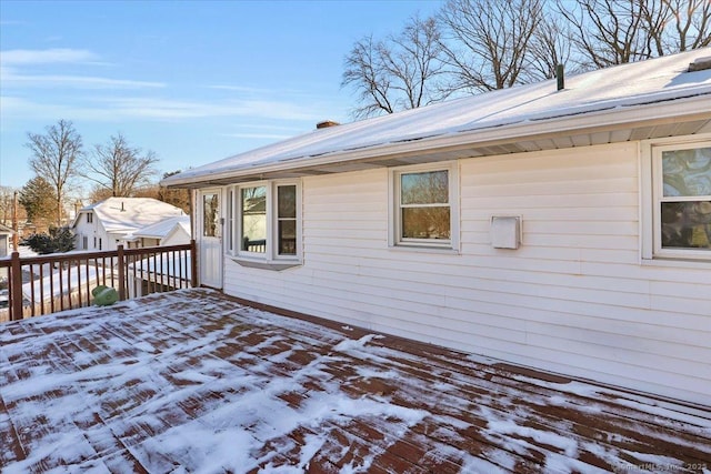 view of snow covered deck