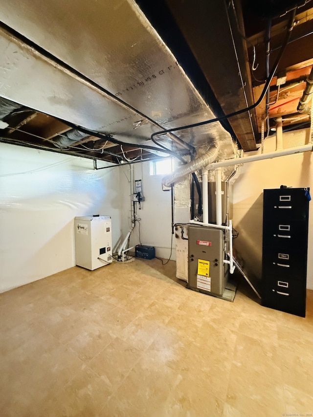 basement featuring heating unit