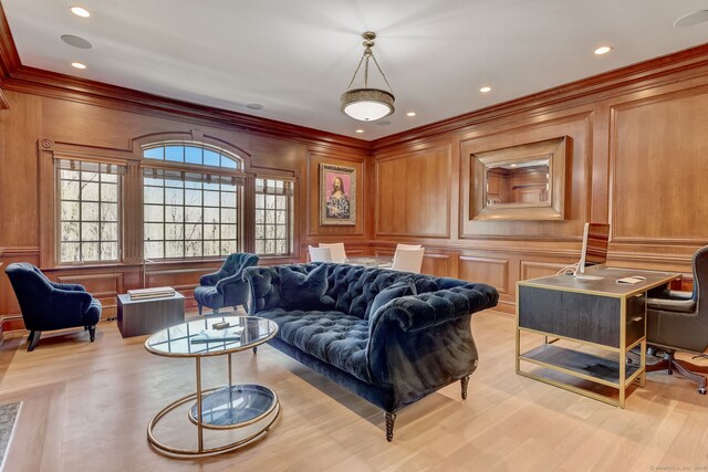 4 Cowdray Park Dr, Greenwich, CT 06831 - living room with crown molding, a decorative wall, light wood-style flooring, and a wealth of natural light