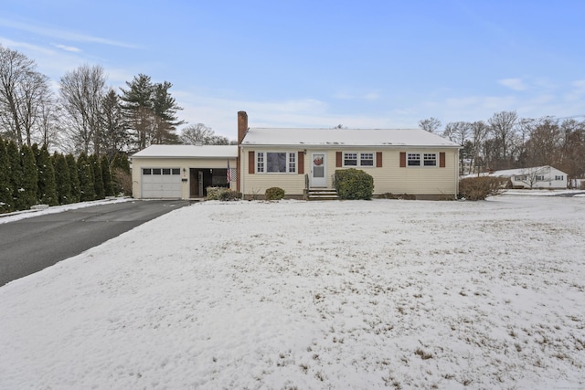 single story home featuring a garage