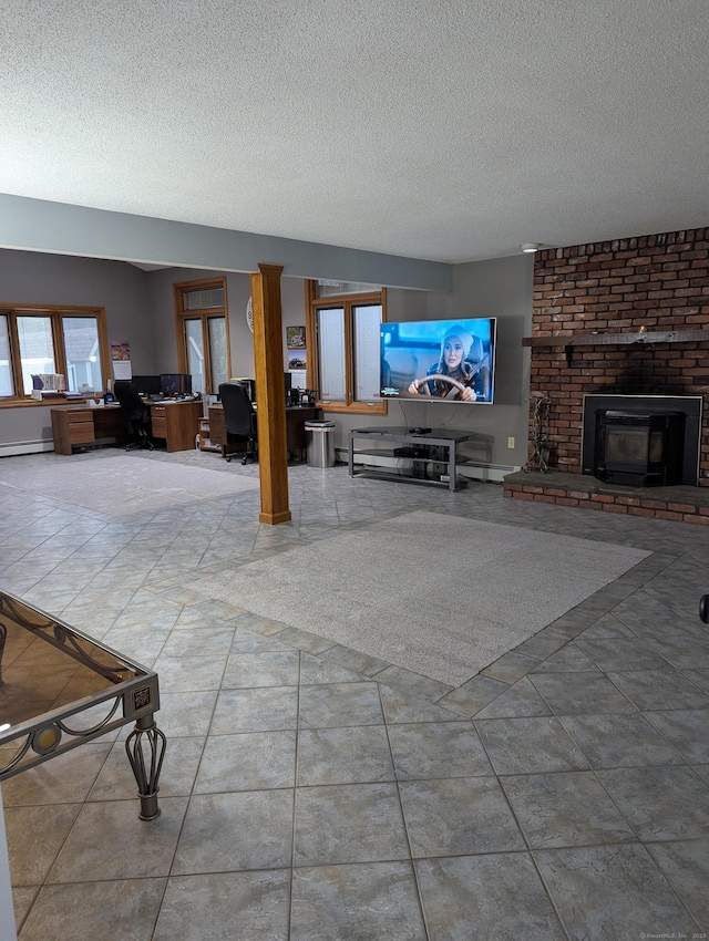 unfurnished living room with a textured ceiling and light tile patterned floors