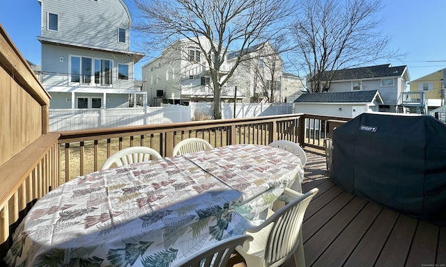 wooden terrace with grilling area