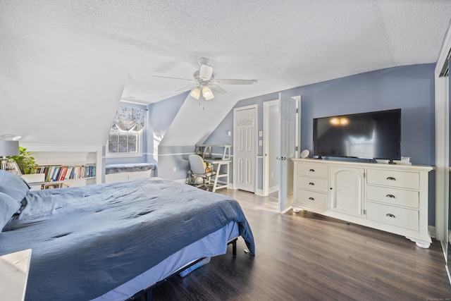 bedroom featuring vaulted ceiling, ceiling fan, hardwood / wood-style floors, and a textured ceiling