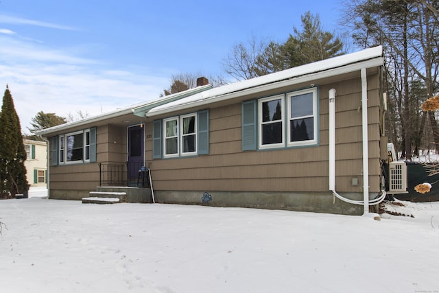 view of front of home featuring cooling unit