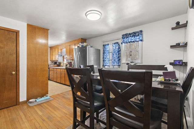 dining room with light hardwood / wood-style flooring