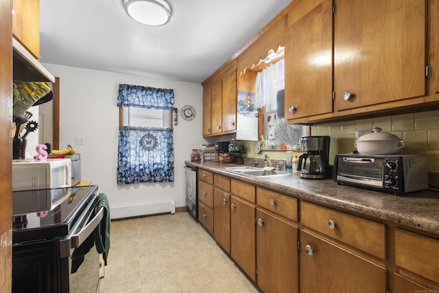 kitchen featuring sink, baseboard heating, backsplash, electric range, and washer / clothes dryer