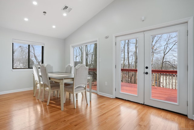12 Willowledge Cir, Waterbury, CT 06704 - dining space featuring french doors, light hardwood / wood-style floors, and vaulted ceiling