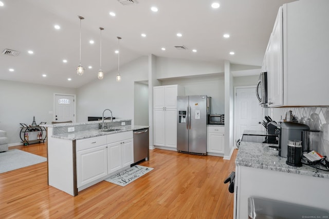 12 Willowledge Cir, Waterbury, CT 06704 - kitchen featuring white cabinetry, sink, pendant lighting, and stainless steel appliances