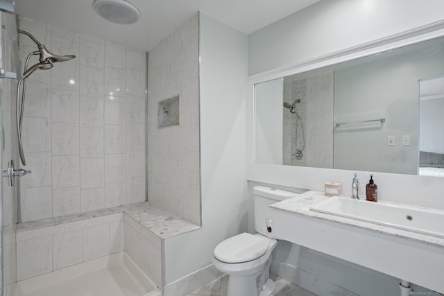 12 Willowledge Cir, Waterbury, CT 06704 - bathroom with vanity, a tile shower, tile patterned floors, and toilet