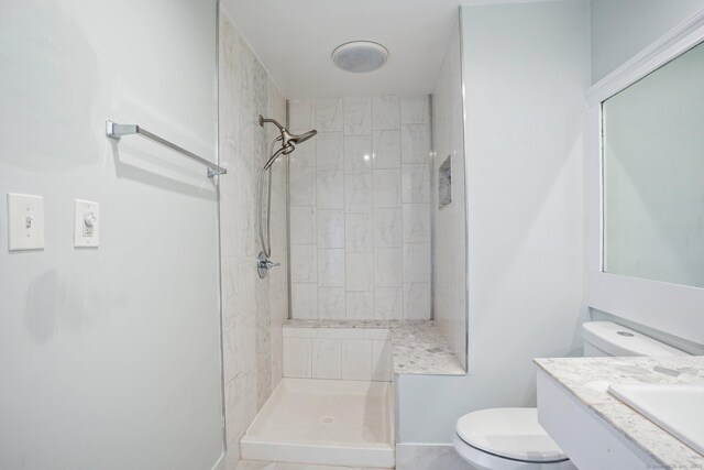 12 Willowledge Cir, Waterbury, CT 06704 - bathroom featuring vanity, a tile shower, and toilet