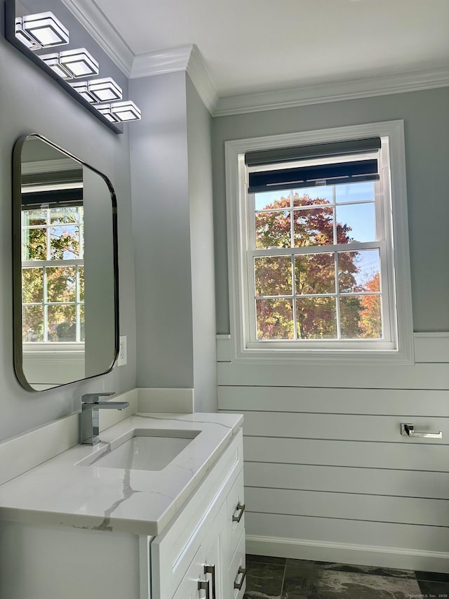 bathroom with vanity and crown molding